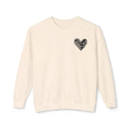An off-white crewneck sweatshirt with a small black hand-drawn heart on the left chest, displayed on a clean white background.