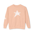A peach-colored crewneck sweatshirt featuring a large white star graphic on the chest and a smaller matching star on the left sleeve, displayed against a clean white background.
