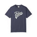 A navy blue short-sleeve crewneck t-shirt with a white graphic on the chest reading 'Tailgate Season' in a retro script font, displayed against a solid white background.
