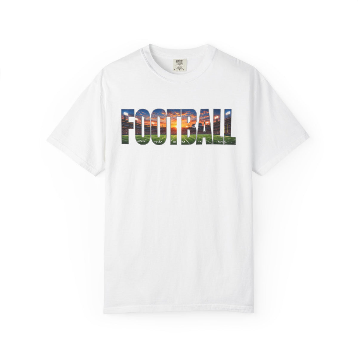 A white short-sleeve crewneck t-shirt featuring the word 'FOOTBALL' printed across the chest in a colorful landscape graphic containing green grass, blue sky, and orange sunset tones, displayed on a clean white background.
