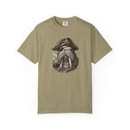 Khaki t-shirt with a walrus wearing a pirate hat and smoking a pipe on a white background