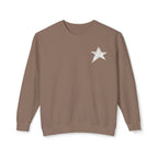 A brown crewneck sweatshirt with a small white glittery star graphic on the left chest, displayed against a clean white background.