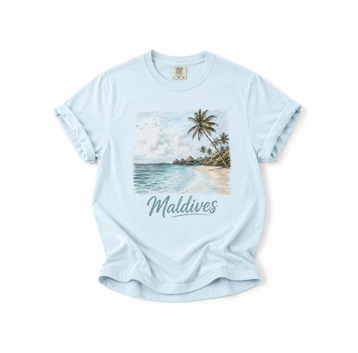 Light blue t-shirt with a tropical beach graphic and 'Maldives' text on a white background